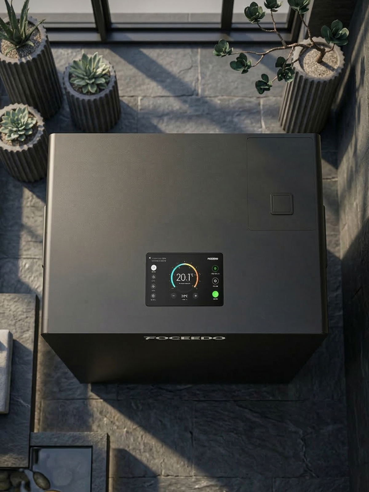 Smart air conditioning unit with digital display on a stone patio, surrounded by potted plants.