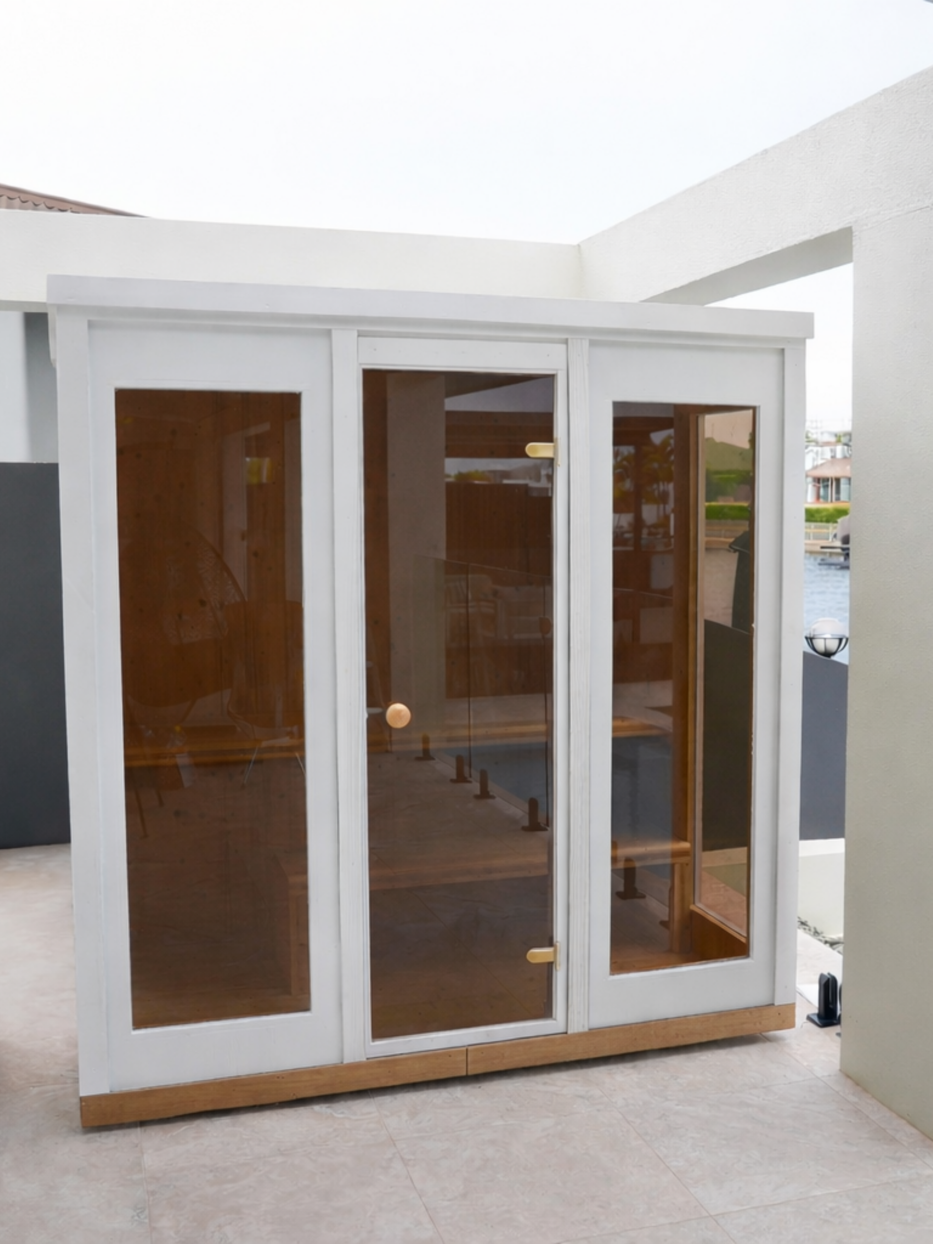 Modern glass door with wooden frame in a home setting