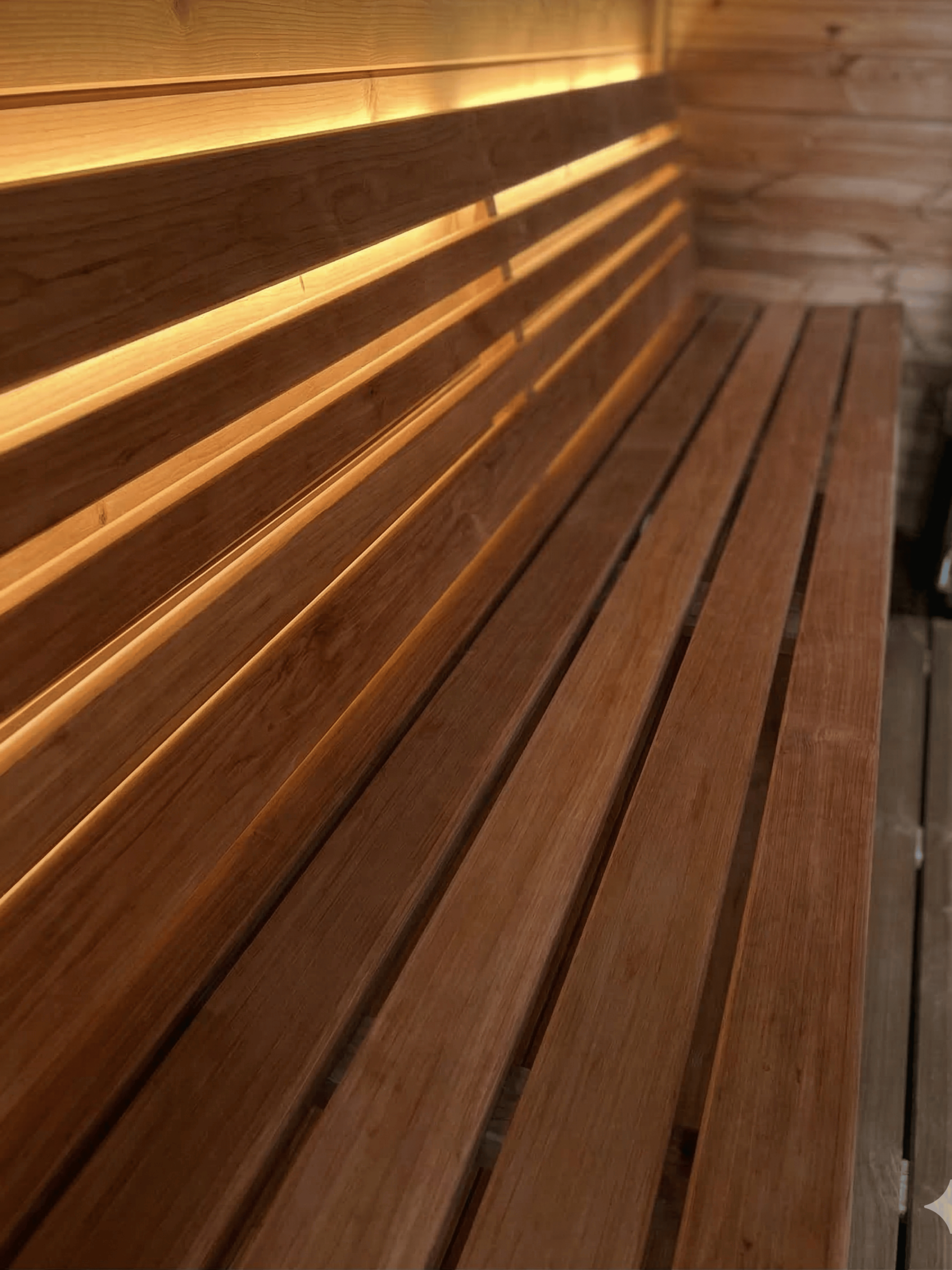 Wooden bench with a warm glow in a wooden interior setting