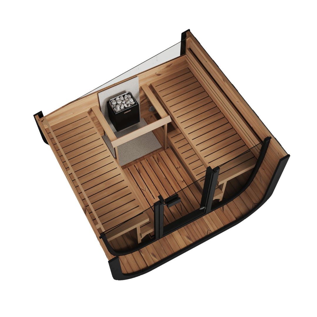 Modern wooden sauna room with two benches facing each other, a central heater with stones, and clear glass doors, set against a black background.