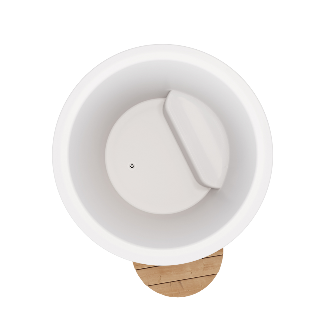 Aerial view of a white, round, open-lid container on a wooden base, set against a black background. The minimalistic design conveys simplicity.