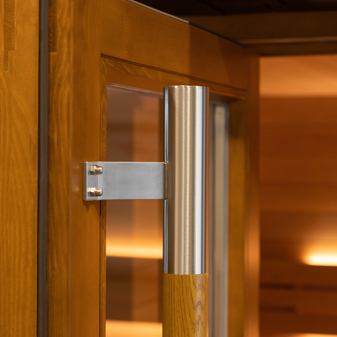 Wooden door with a metallic handle and glass panel