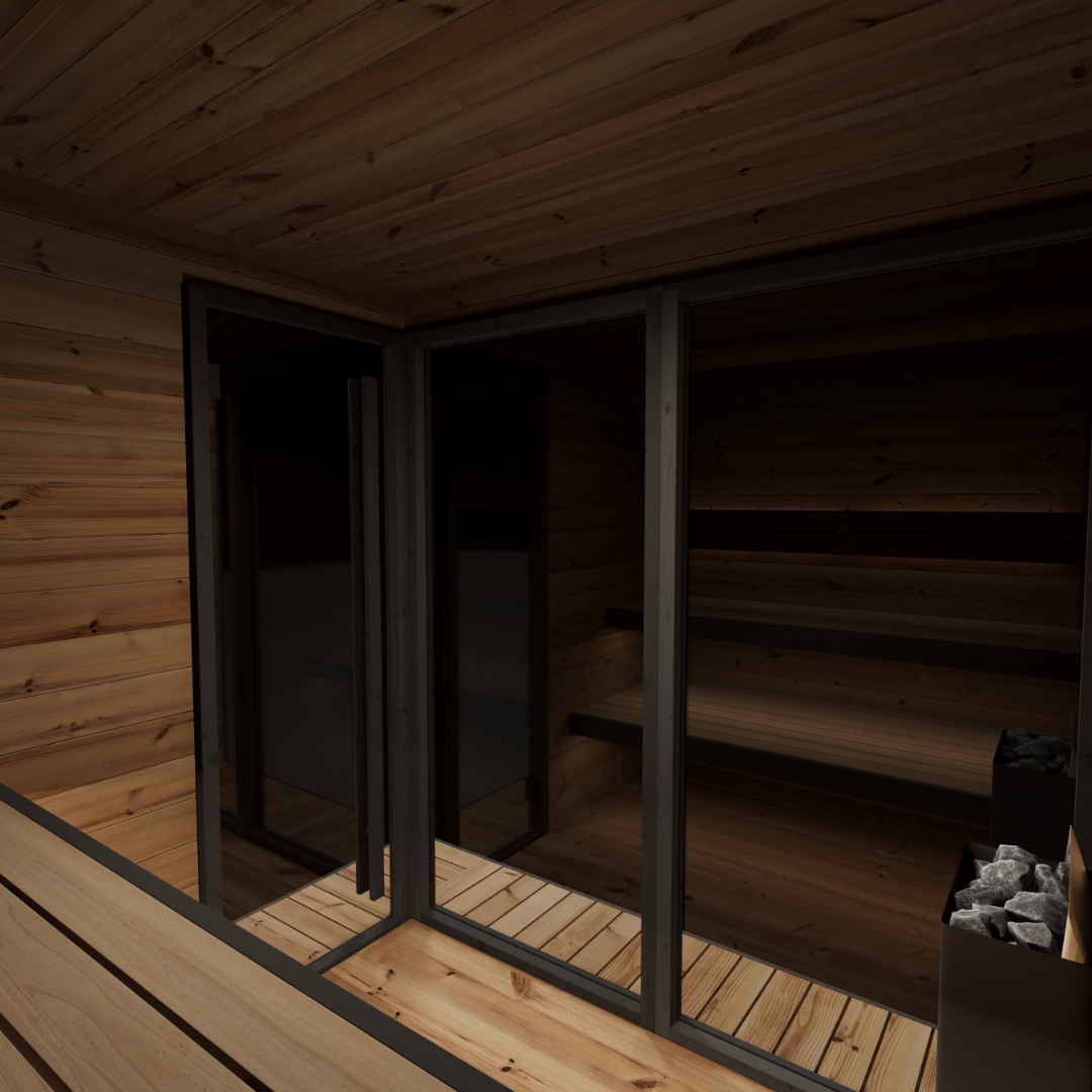 Wooden interior of a sauna with benches and glass doors.