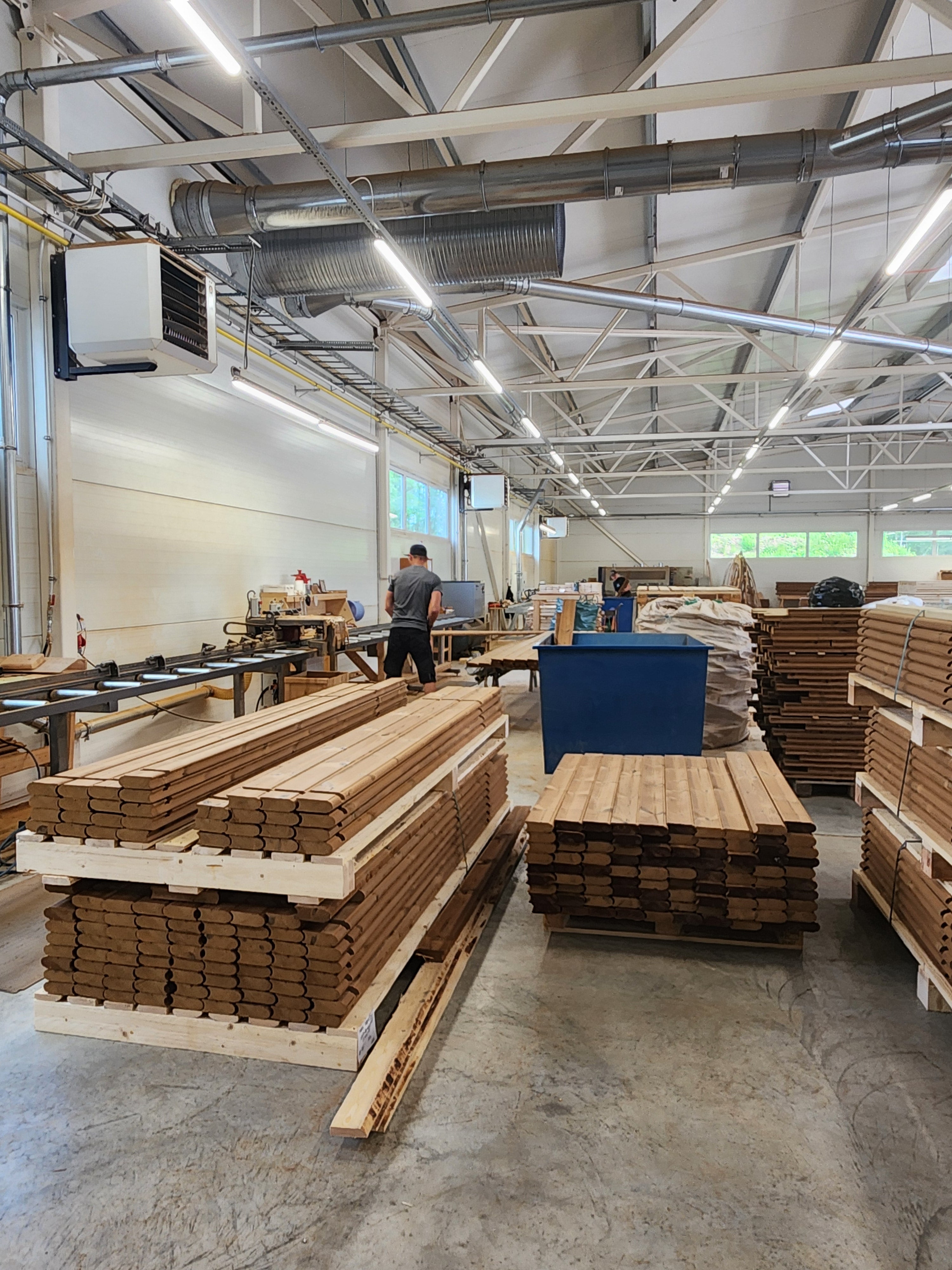 Storage warehouse with wooden pallets and shelves