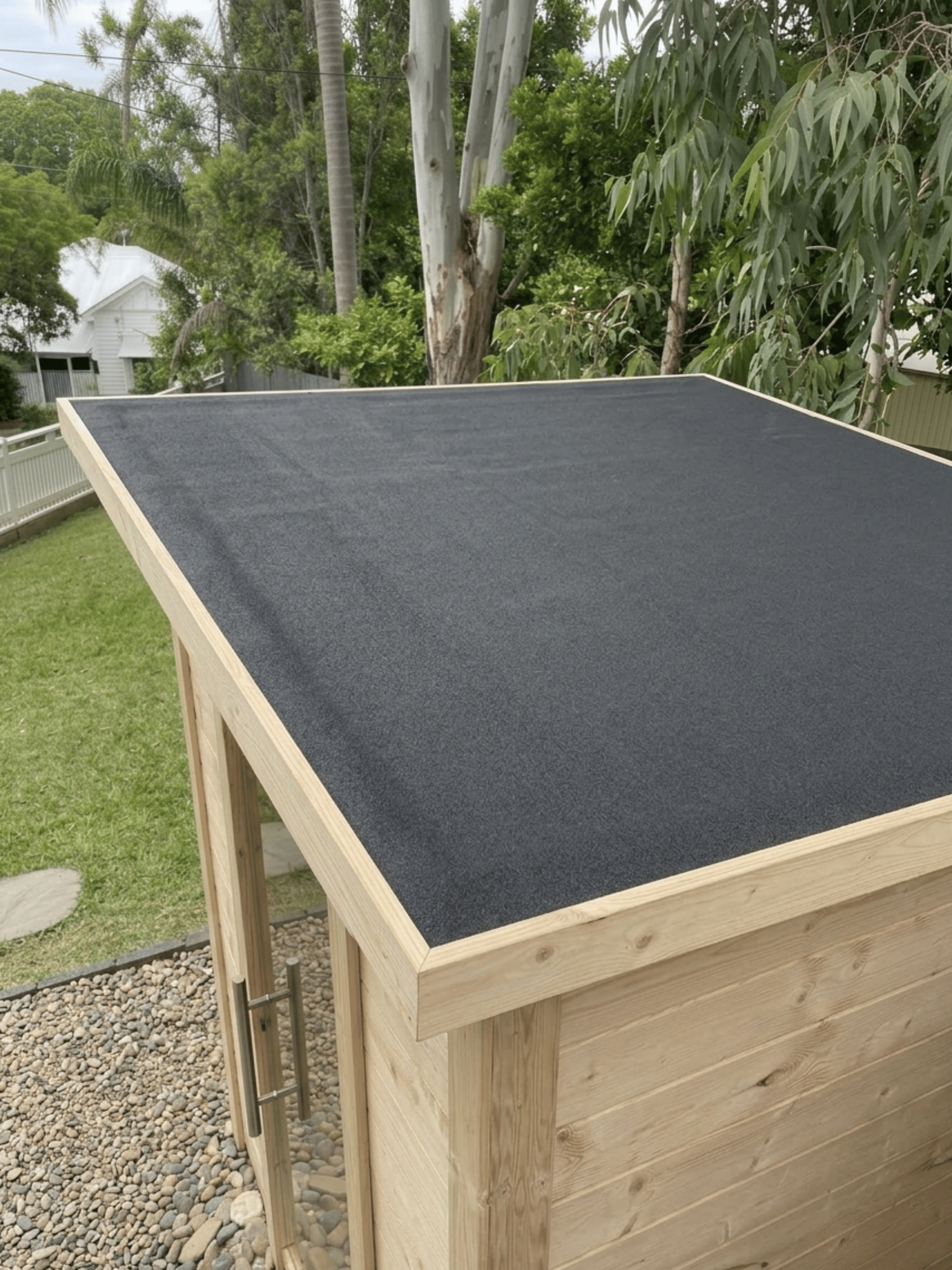 Wooden structure with a dark roof in an outdoor setting