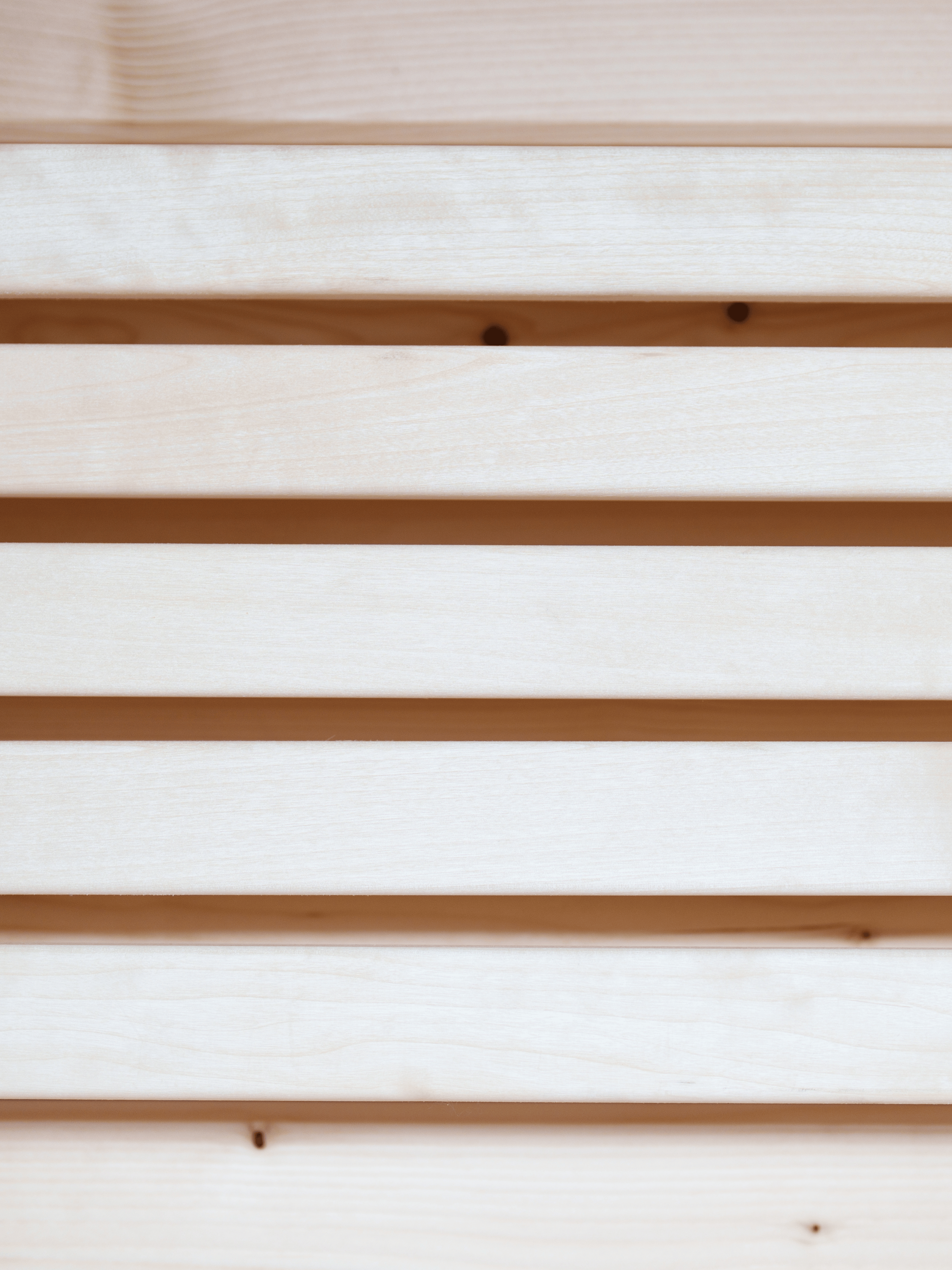 Close-up of wooden slats with a white background